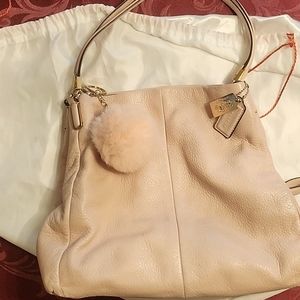 This is a coach baby pink bag leather,  GC